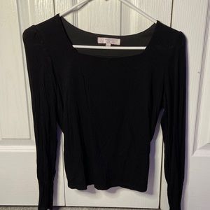 Girls plain curved neck black long sleeve shirt